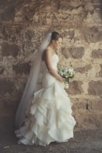 Made to measure Bridal gown with strapless lace bodice and silk organza ruffle skirt by Clasch Design