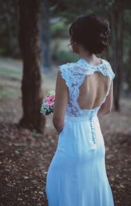 Chantilly lace Wedding gown with cut out detail. Trimed with beautiful scalloped edge by Clasch Design